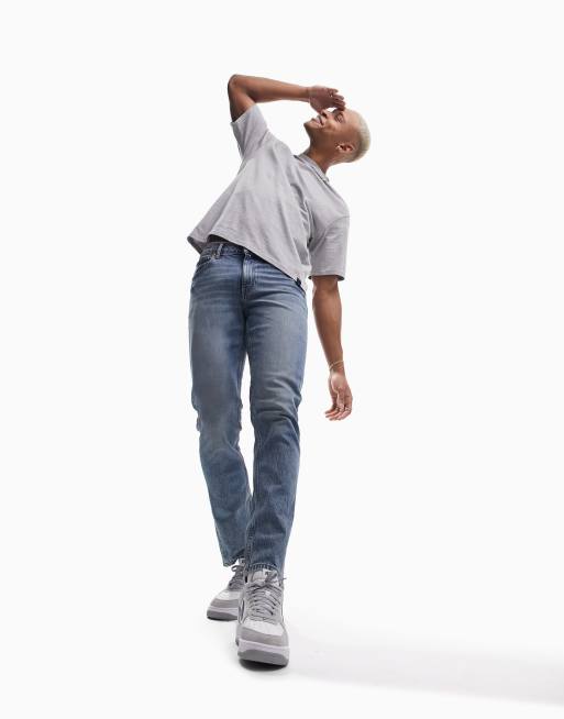 ASOS DESIGN - Cone Mill - Smalle denim 'American classic' jeans in getinte mid-wash blauw , 4 van 4