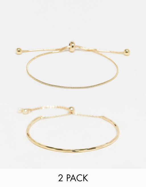 ASOS DESIGN - Confezione da 2 bracciali color oro con fermacorda