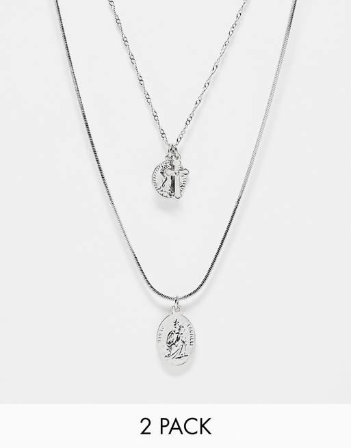 ASOS DESIGN - Confezione da 2 collane con ciondoli a croce e con San Cristoforo color argento 