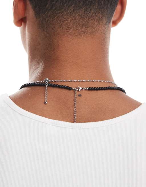 ASOS DESIGN - Confezione da 2 collane da festival color argento e nera con pietre semipreziose e perline e ciondolo con croce e moneta, 3 di 3