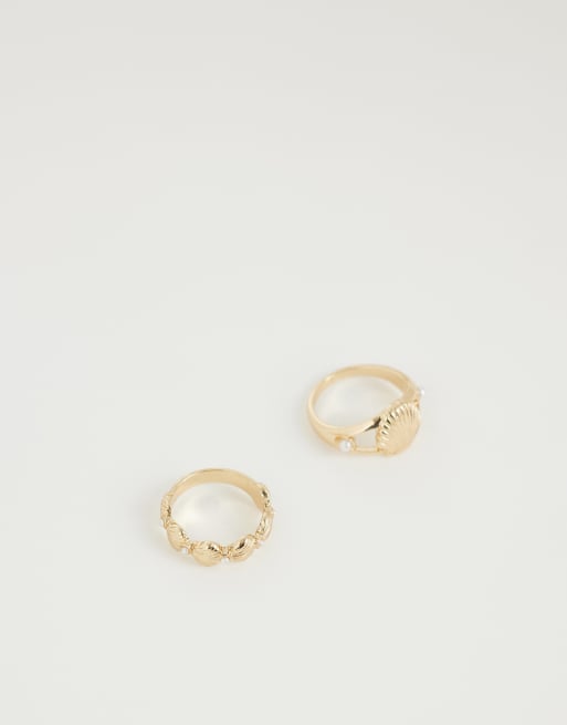 ASOS DESIGN - Confezione da 2 mini anelli con conchiglie color oro