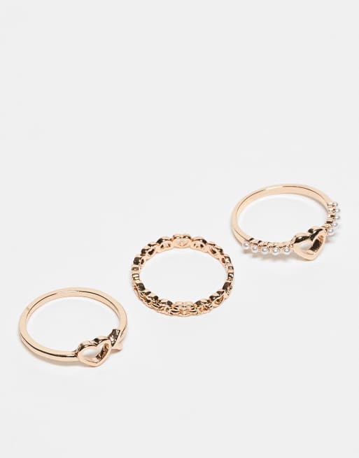 ASOS DESIGN - Confezione da 3 anelli color oro con cuori