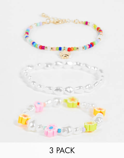 ASOS DESIGN - Confezione da 3 braccialetti con perle, perline miste e ciondoli a stella