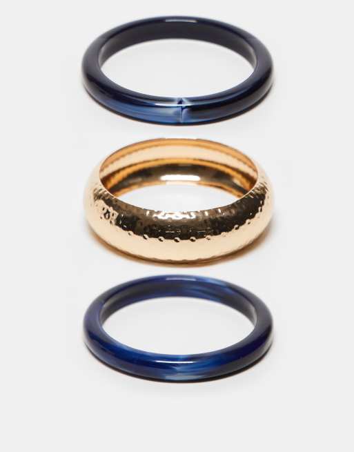 ASOS DESIGN - Confezione da 3 bracciali rigidi in resina blu scuro e color oro