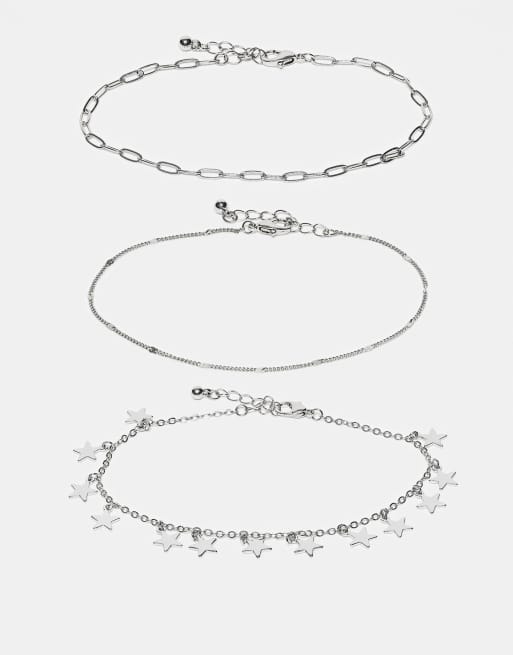 ASOS DESIGN - Confezione da 3 cavigliere argentate con charm a forma di stella