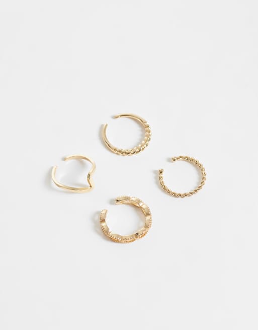 ASOS DESIGN - Confezione da 4 anelli da piede color oro