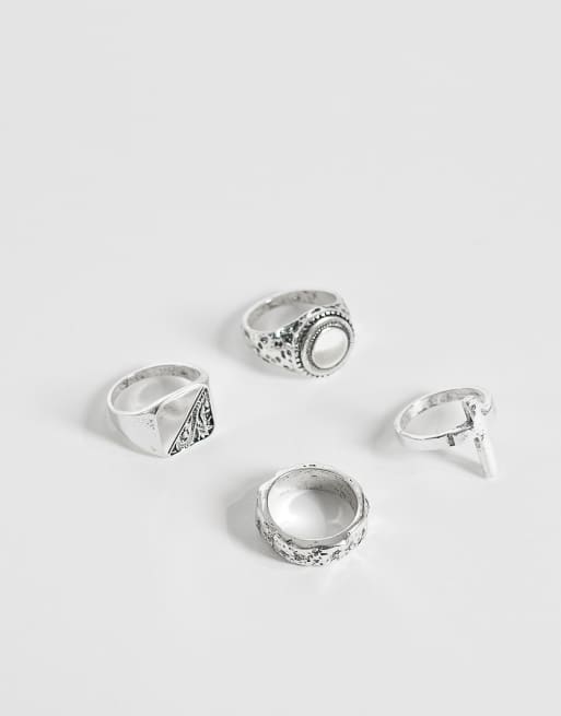 ASOS DESIGN - Confezione da 4 anelli tonalità argento brunito con dettaglio inciso e croce