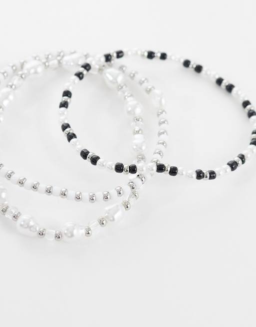 ASOS DESIGN - Confezione da 4 bracciali con perline, pietre nere e catenina argentata, 2 di 3