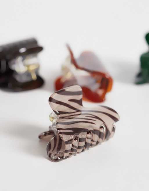 ASOS DESIGN confezione da 4 mini fermagli a pinza con stampe animalier assortite, 2 di 3