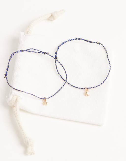 ASOS DESIGN - Confezione da due bracciali in corda con perline e charm celestiali dorati con sacchetto regalo, 2 di 3