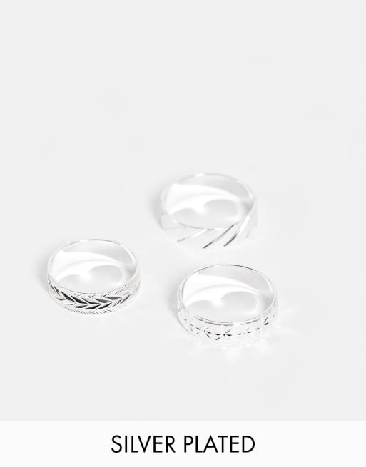 ASOS DESIGN - Confezione da tre anelli con intarsi placcati vero argento