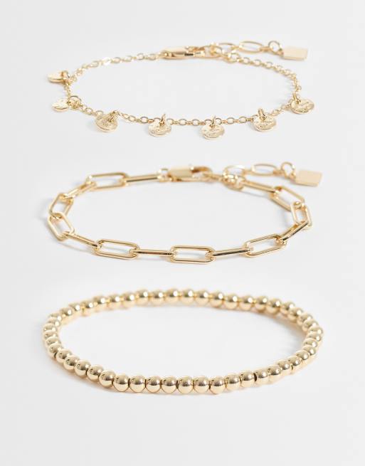 ASOS DESIGN - Confezione multipack di bracciali misti con perline e catenina color oro