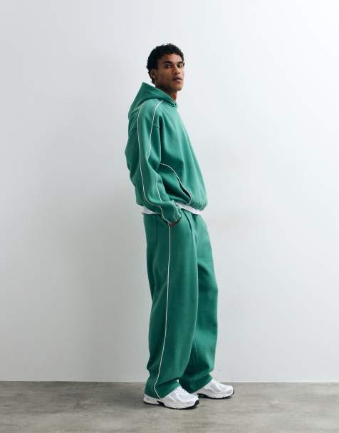 ASOS DESIGN - conjunto de jogger muy holgado con ribetes en verde - view 1