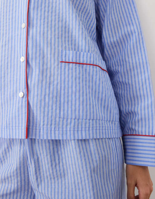 ASOS DESIGN conjunto de pijama de camisa de manga larga y pantalón de pernera ancha de algodón tejido con rayas azules, 3 de 4