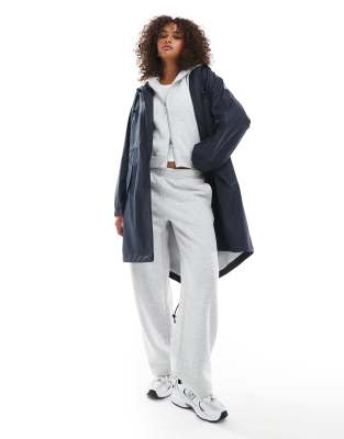 ASOS DESIGN contrast detail rubberized rain trench in navy