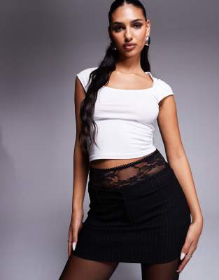 contrast lace waistband skort in black pinstripe