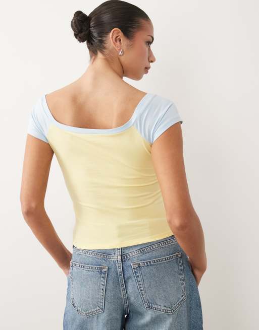 ASOS DESIGN contrast raglan baby tee with Playa Norte embroidered graphic in yellow, 4 of 4