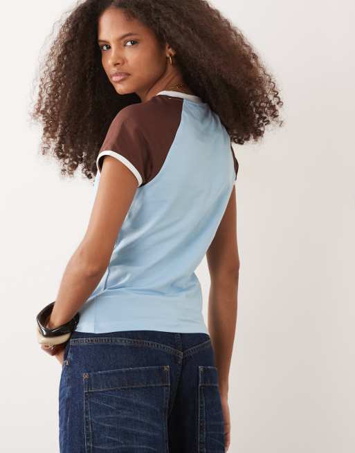 ASOS DESIGN contrast raglan sleeve t-shirt with highly favoured graphic in light blue and chocolate, 4 of 4