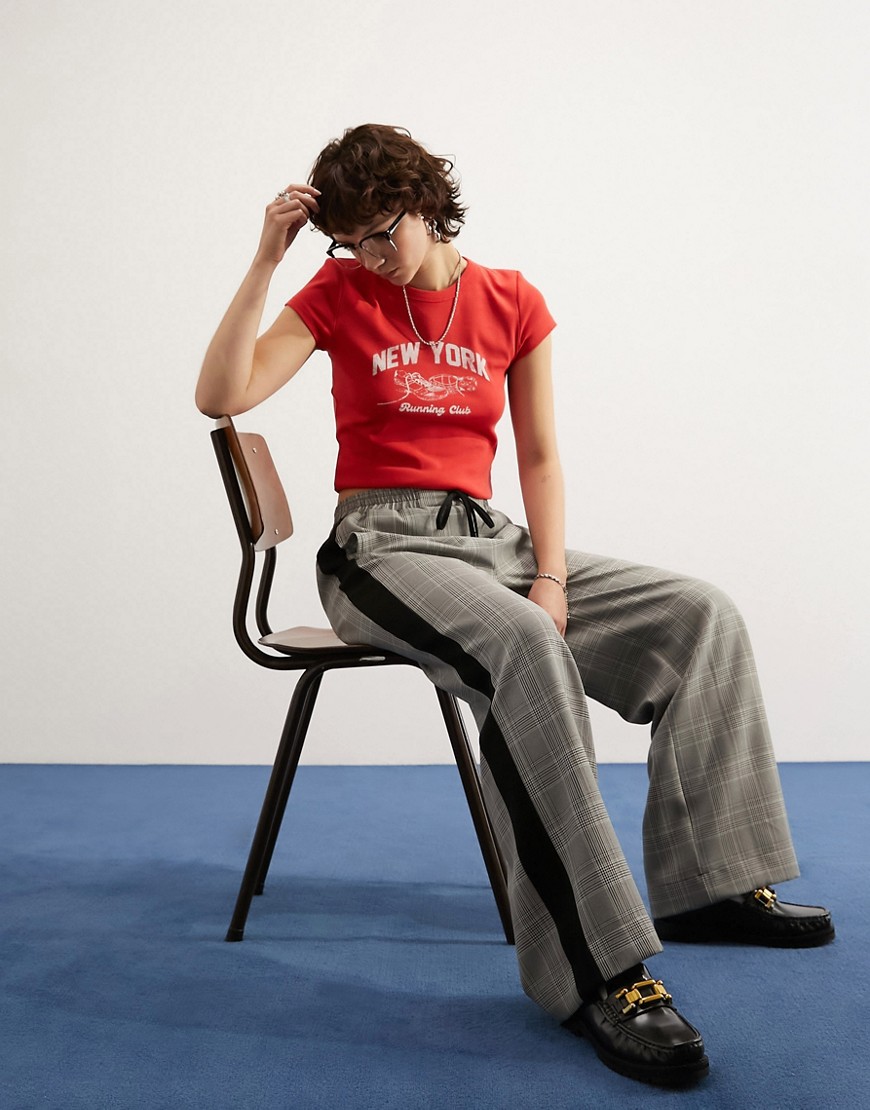 ASOS DESIGN contrast side stripe trousers in check print-Multi
