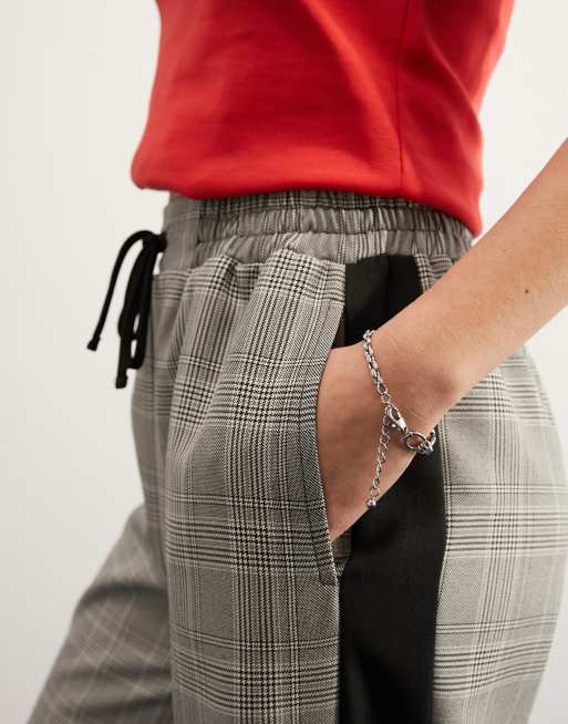 Checkered side stripe trousers on sale