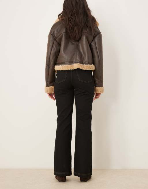 ASOS DESIGN contrast stitch wide leg flare jeans in black