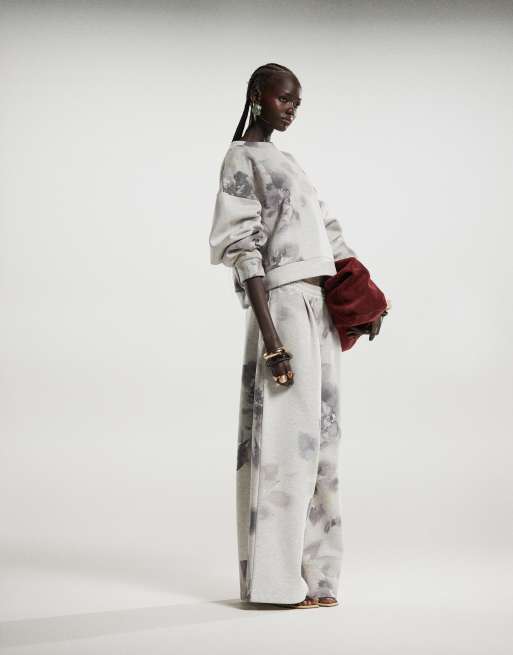 ASOS DESIGN - Coordinato con felpa oversize e joggers con stampa a fiori
