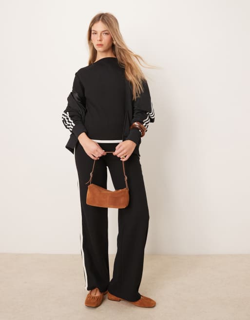 ASOS DESIGN - Coordinato nero a nido d'ape con top e pantaloni con dettagli a contrasto