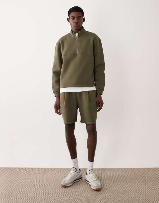 ASOS DESIGN - Coordinato verde con top comodo con zip corta e orlo fisso e pantaloncini oversize a pieghe
