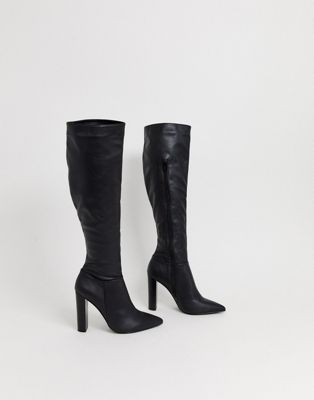 black heeled knee length boots