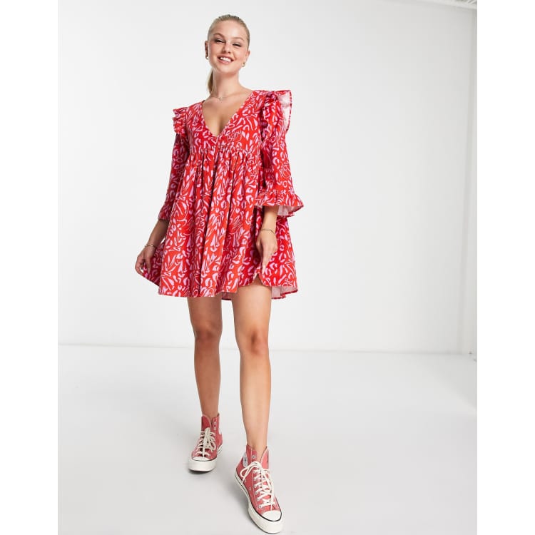 ASOS DESIGN cord mini smock dress with ruffle shoulder in red abstract print