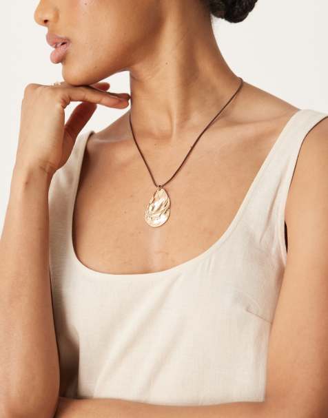 ASOS DESIGN cord necklace in brown with gold-tone mussel shell pendant - view 1