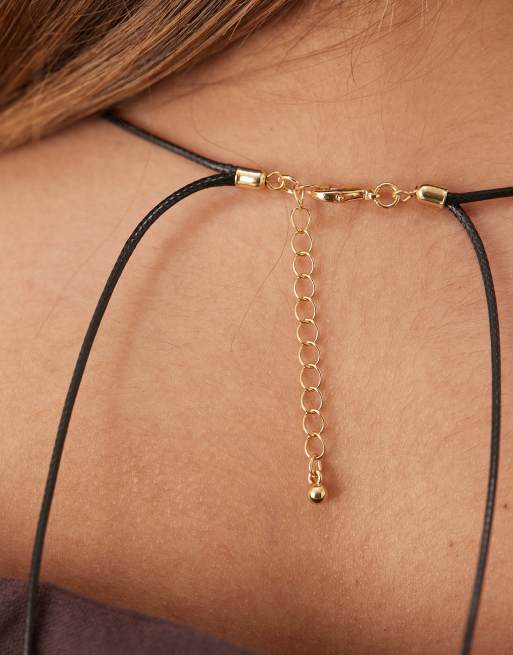 ASOS DESIGN cord necklace with faux-shell pendant