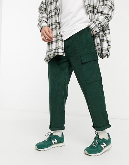 ASOS DESIGN cord relaxed skater cargo trousers in forest green