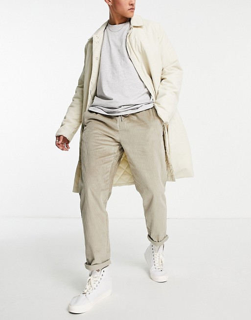 ASOS DESIGN cord slim trousers with elasticated waist in dark beige