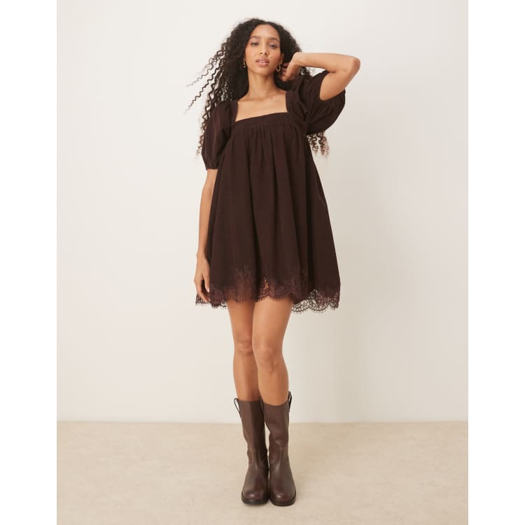 dark brown patterned scoop neck babydoll dress with quarter sleeves ASOS DESIGN cord square mini puff and lace trim in chocolate Step into the season Soblazn Blue One Shoulder Beaded Color:Midnight Black ($118.66)