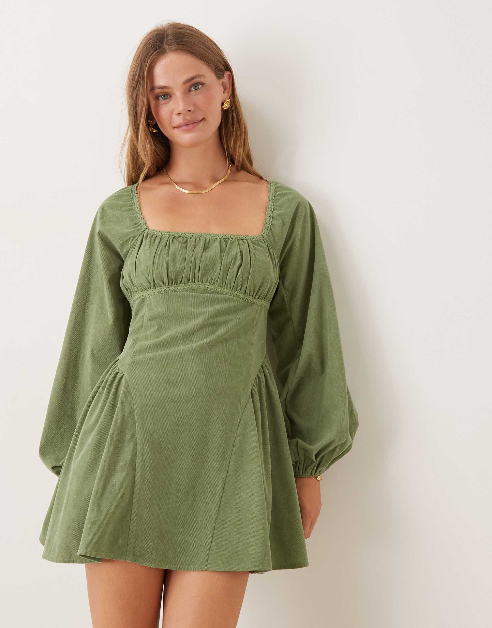 asos design cord square neck gathered bust mini dress with volume sleeves and lace trim in washed pistachio green