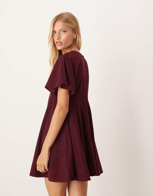 ASOS DESIGN cord T-shirt mini dress with stitching detail in plum
