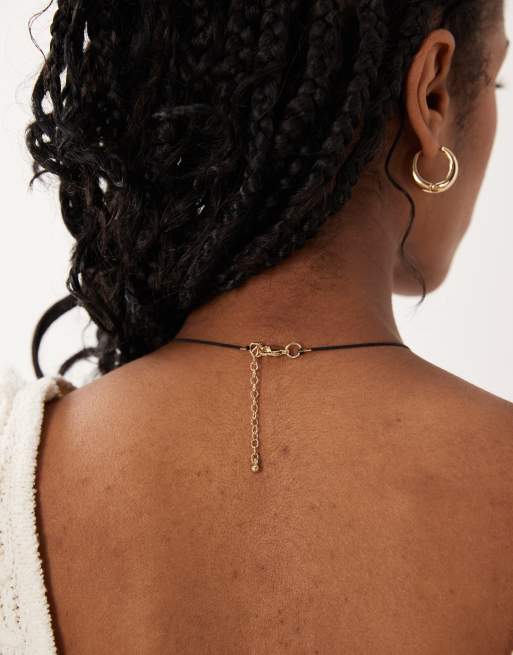 ASOS DESIGN corded necklace with resin pendant and tassels in black, 3 of 4