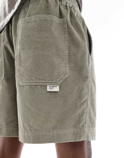 ASOS DESIGN corduroy shorts with workwear patch in khaki