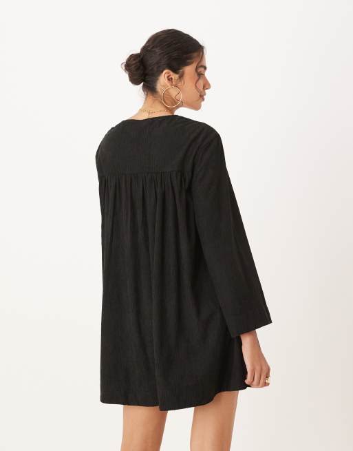 ASOS DESIGN corduroy tie front mini smock dress in black