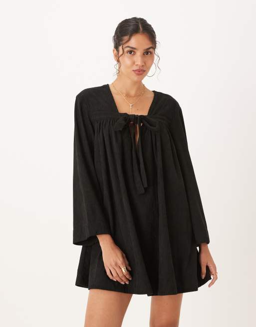 ASOS DESIGN corduroy tie front mini smock dress in black