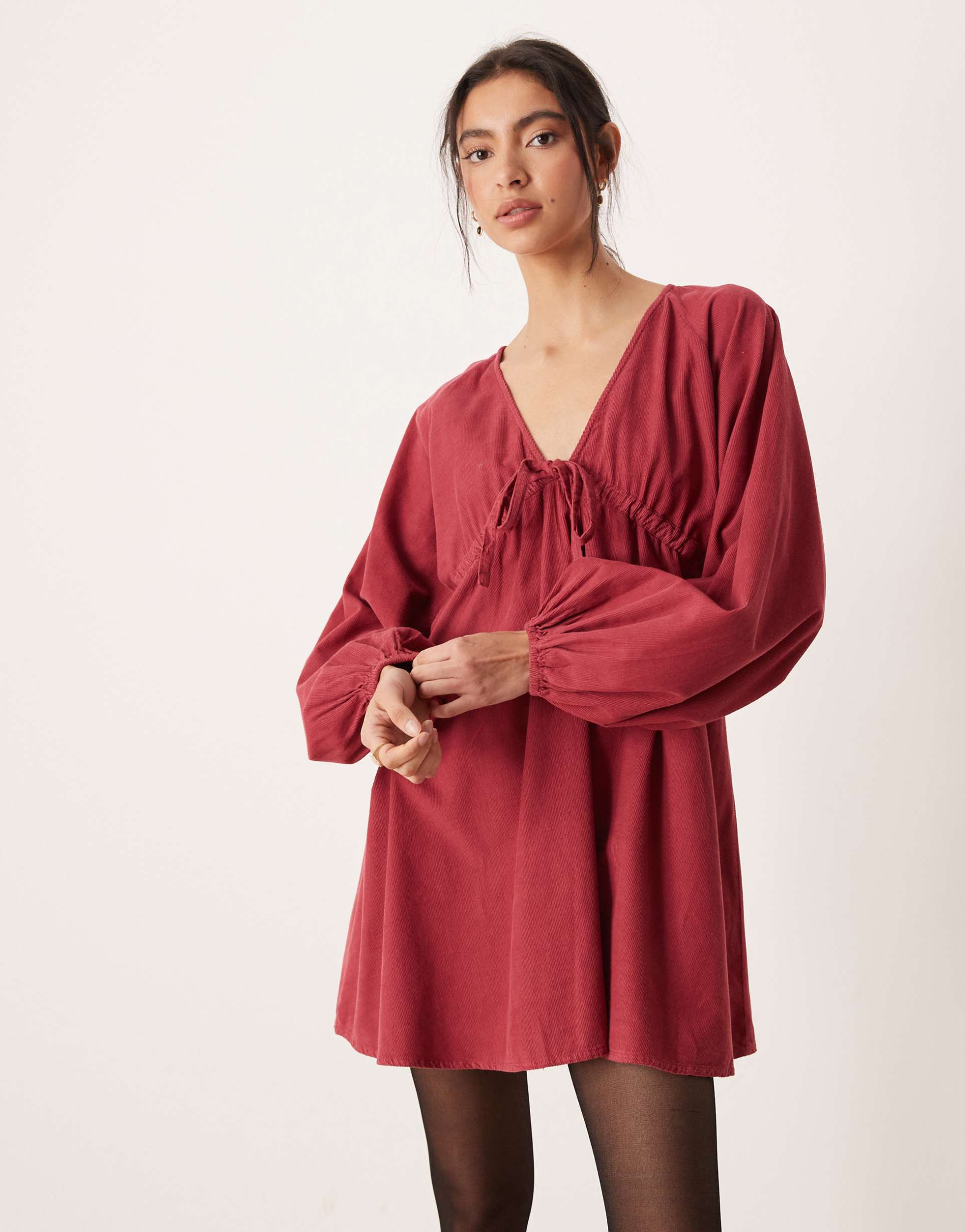 asos design corduroy v-neck tie bust mini dress with volume sleeve in washed burgundy
