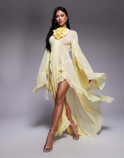 asos corsage cape maxi dress DESIGN satin detail in blue The ASOS DESIGN exaggerated cape maxi dress in navy is a stunning choice for evening wear ASOS DESIGN corsage extreme ruffle
