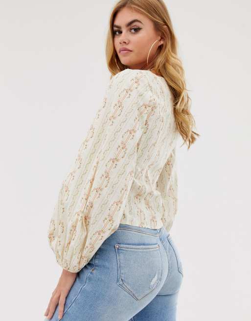 ASOS DESIGN corset detail top with bell sleeve in vintage floral print