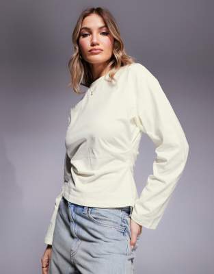 corset waist long sleeve tee in coconut milk-White