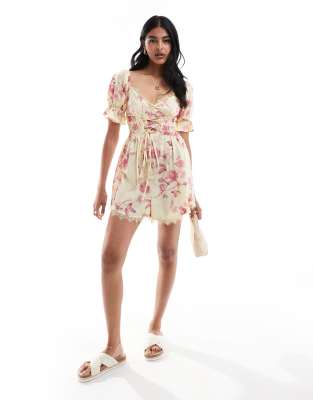 ASOS DESIGN corset waist milkmaid playsuit and pink floral