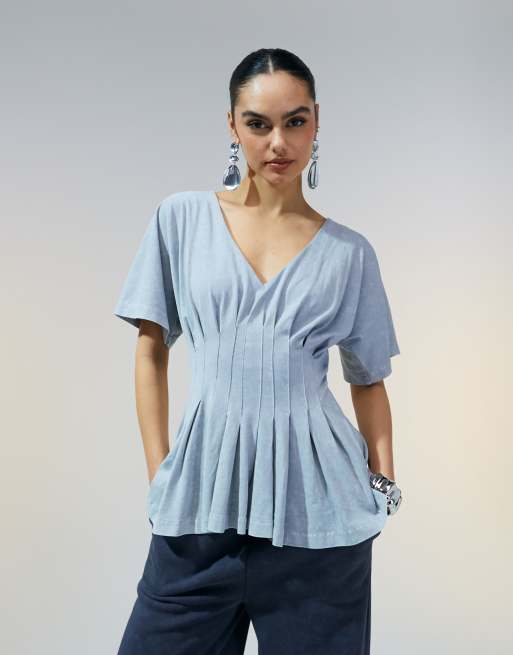 ASOS DESIGN corset waist tee with pleat detail in washed blue