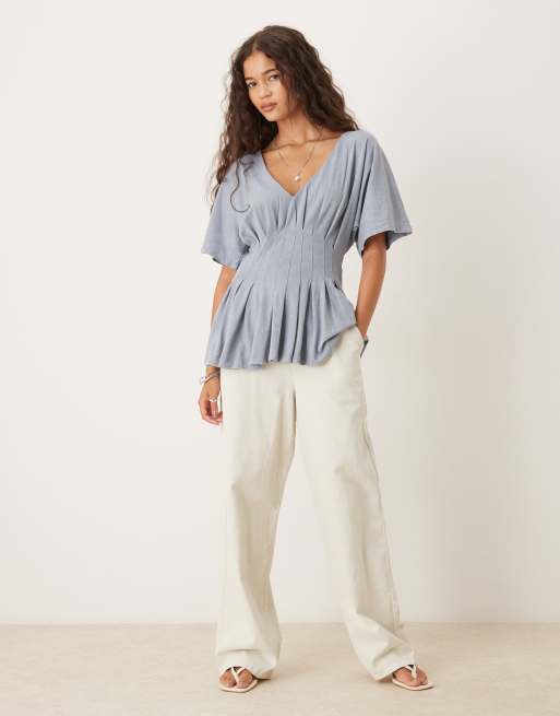 ASOS DESIGN corset waist tee with pleat details in washed blue