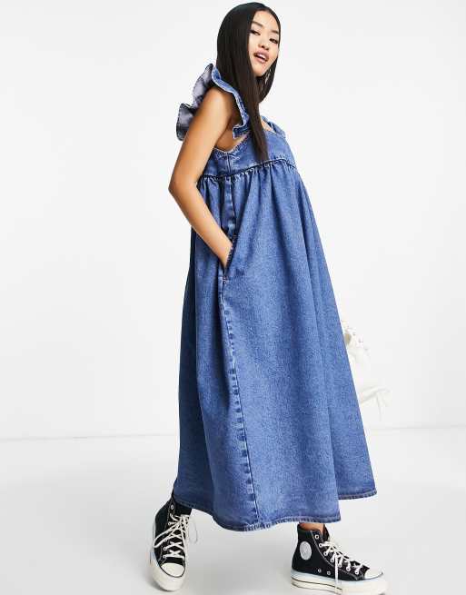 ASOS DESIGN cotton blend denim frill sleeve midi pinny in mid wash MBLUE