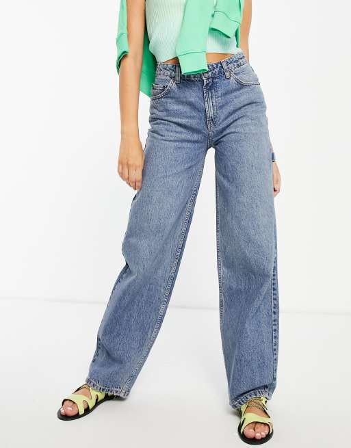 ASOS DESIGN cotton blend mid rise oversized 'skater' jeans in greencast ...